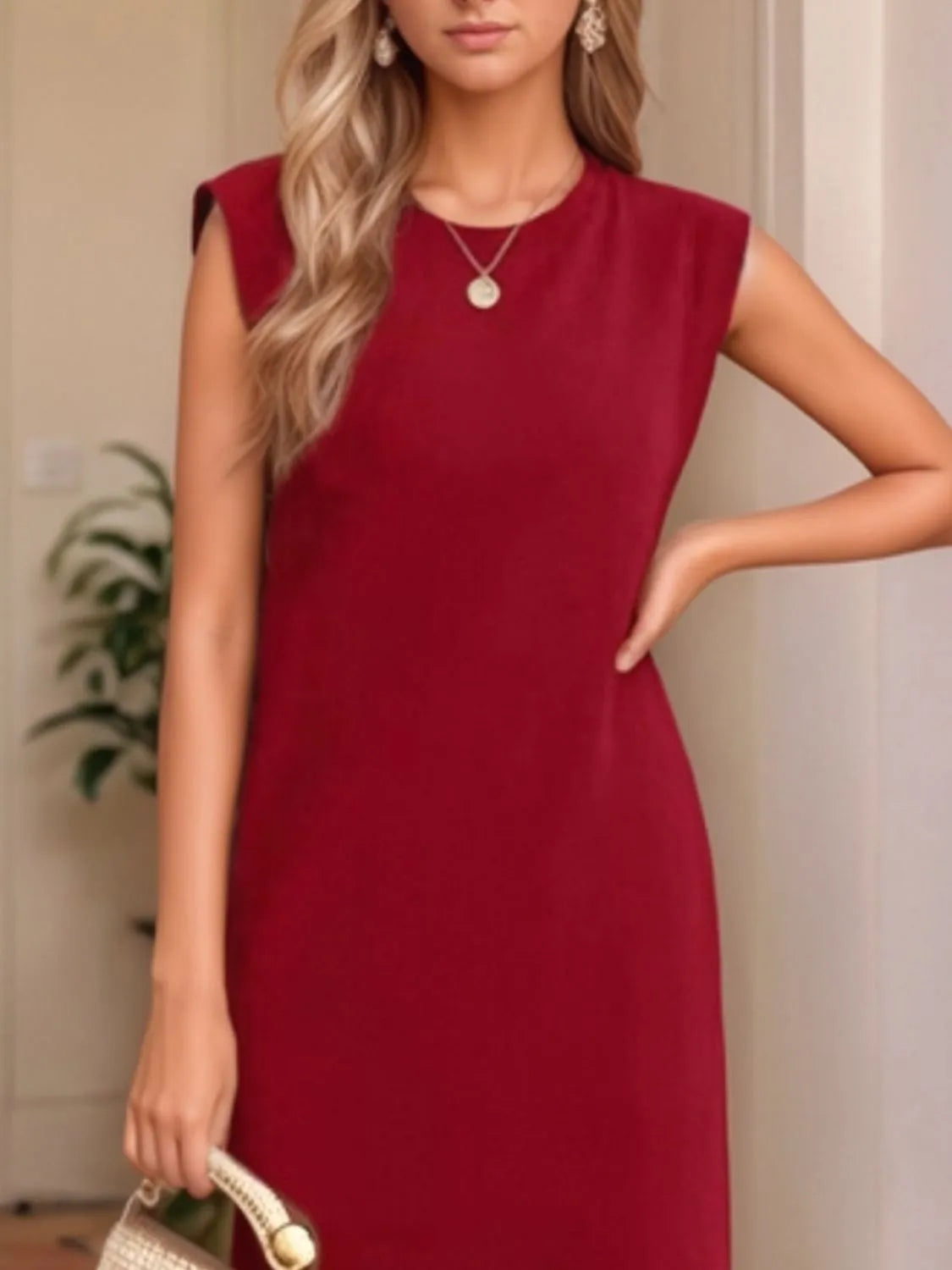 woman wearing red sleeveless dress