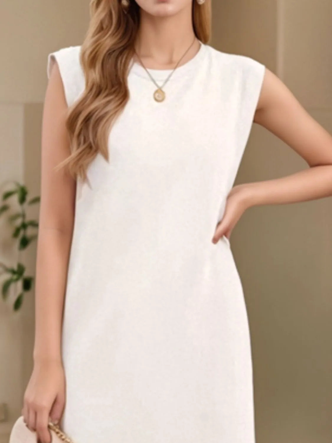 Woman wearing a white dress with a blurred background